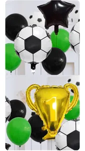 Detail of football party balloon set with golden champion trophy and soccer printed balloons