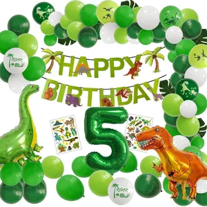 Detail of a 5th birthday dinosaur party set with green balloons, banner and stickers