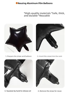 Vue macro du dégonflage d'un ballon étoile noir avec une paille de réutilisation