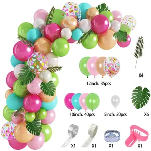 Flamingo themed balloon arch kit with tropical palm leaves for birthday party decor
