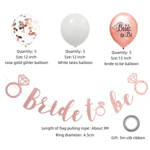 Detail of Bride to Be rose gold confetti balloons and glitter banner for bridal party