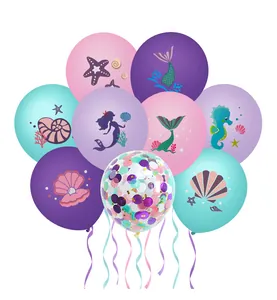 Detailed view of mermaid party balloons with seahorse, starfish, and shell prints