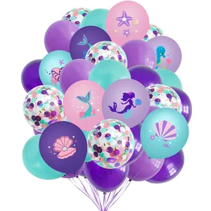 Detailed view of mermaid party balloons with printed sea shells and colorful confetti