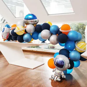 Space theme balloon arch kit with astronaut rocket and planet foil balloons for party decor