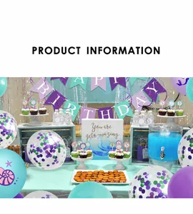 Close-up of mermaid party kit with purple and mint balloons and happy birthday banners