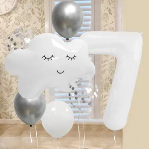Detail of cloud face balloon and silver number 7 balloon set for kids birthday party