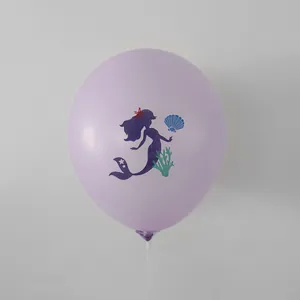 Detail of light purple mermaid print latex balloon with seashell and coral graphics