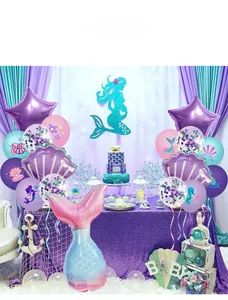 Detailed view of mermaid theme balloon set with foil tail shell and starfish party decor