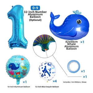 Detail view of 1st birthday ocean set with blue number 1, whale, and confetti balloons