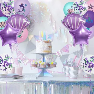 Detail of mermaid theme party balloon set with foil stars shells and printed latex balloons
