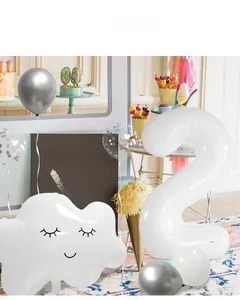 White number 2 and smiley cloud foil balloons set for a 2nd birthday party decoration