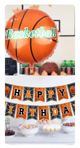 Detail of basketball balloon and Happy Birthday banner for sports theme party set