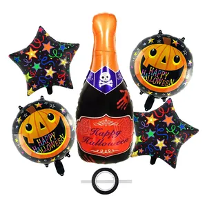 Detail of Halloween balloon set with pumpkin stars and skull bottle including ribbon