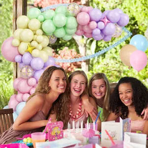 Pastel macaron balloon arch kit with gold stars and confetti balloons for birthday parties
