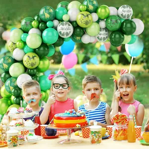 Dinosaur birthday balloon arch kit with forest green latex balloons and roar jungle prints