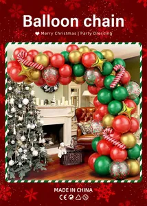 Detailed Christmas balloon arch with candy cane foil balloons and festive fireplace