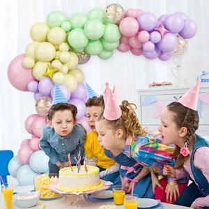 Pastel macaron balloon arch kit with gold sequins and star balloons for kids birthday party