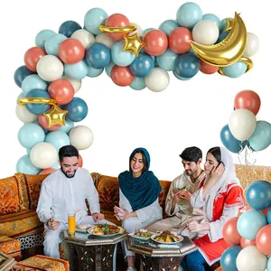 Pastel balloon arch kit with golden moon and star foil accents for gender reveal parties