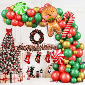 Detail of Christmas balloon arch with gingerbread man and candy cane foil balloons