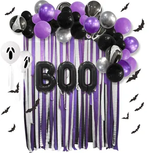 Halloween party decoration kit with BOO balloon arch, bats, and purple fringe curtains