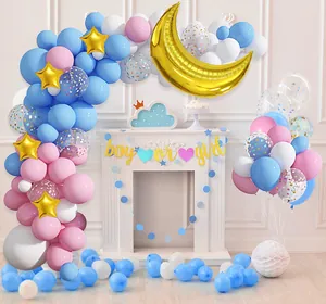 Blue and pink baby shower balloon arch with golden moon star balloons and boy or girl banner