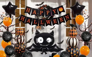 Detail of Halloween party set with bat foil balloon and Happy Halloween banner