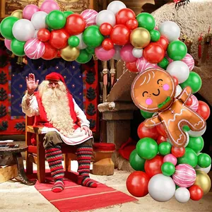 Close-up of Christmas balloon arch set featuring gingerbread man and candy cane foil balloons