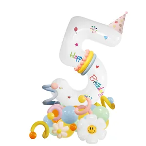 Detail of white number 5 balloon set with daisy and pastel macaron balloon base