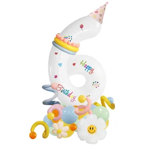 Daisy number 6 foil balloon stand with Happy Birthday patterns and macaron balloons