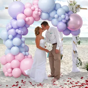 Pastel pink and blue balloon arch kit with matte macaron colors for beach wedding decor