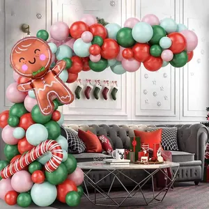 Christmas balloon arch with gingerbread man and candy cane foil balloons for party decor
