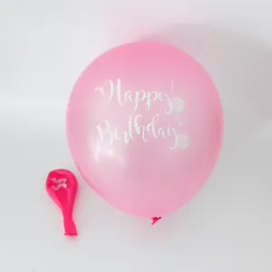 Detail of pink Happy Birthday mermaid party balloon with white shell pattern print