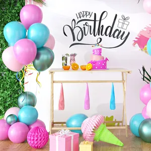 Flamingo themed birthday party balloon arch kit with pink and blue tassels and honeycomb balls