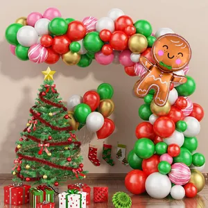 Christmas balloon arch kit with gingerbread man and candy cane foil decorations