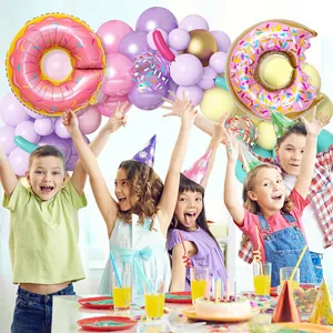 Donut themed party decoration kit with macaron balloons and donut foil balloons for birthdays