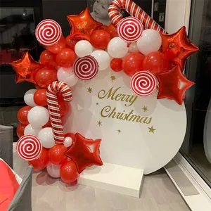 Christmas balloon arch kit with red and white candy cane and star foil decorations