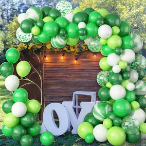 Retro sage green balloon arch kit with white and confetti balloons for outdoor party decor