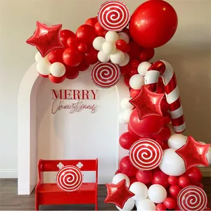 Christmas balloon arch kit with red and white candy canes and lollipop foil balloons