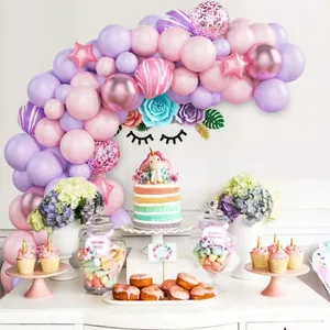 Unicorn themed balloon arch with pink and purple latex balloons for girl birthday party