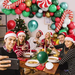 Kit de arco de globos navideños con globos rojos y verdes y bastones de caramelo foil