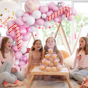 Kit arche de ballons de Noël rose et blanc avec ballons en aluminium canne de Noël