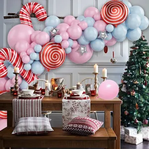 Christmas balloon arch kit with pink and blue latex balloons and candy cane foil decorations
