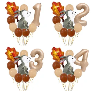 Close-up of squirrel and maple leaf foil balloons for forest theme birthday party decor
