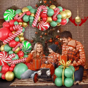 Christmas balloon arch kit with red, green, and gold balloons for festive holiday decor