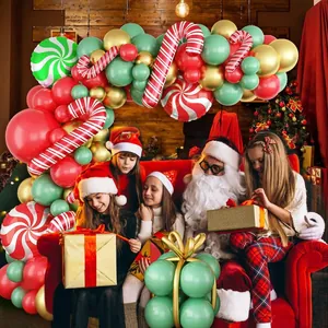 Christmas party decoration set with red and green balloons, candy cane and swirl foil balloons
