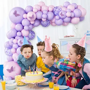 Detail of lavender and macaron purple balloon arch with decorative hollow butterflies