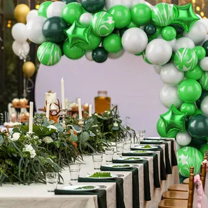 Nature themed forest balloon arch kit with agate green and gold star foil balloons