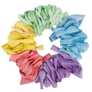 Flat lay of colorful macaron latex balloons in mint green, pink, purple, blue and yellow