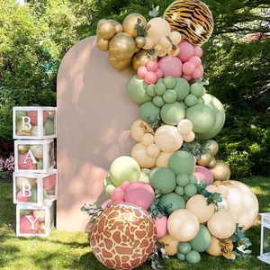 Jungle themed balloon arch kit with tiger prints and gold accents for baby shower decor