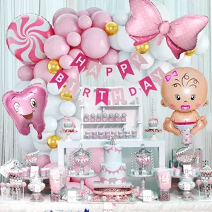 Pink and white baby shower balloon arch kit with cartoon tooth foil balloons and banner